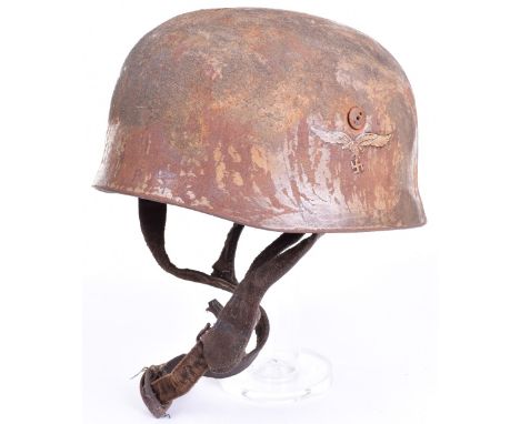 German Luftwaffe Double Decal Paratrooper (Fallschirmjager) Combat Helmet, having a Normandy style camouflage paint finish. L