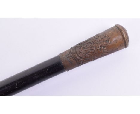 British Military Regimental Swagger Stick, with white metal thimble top having regimental badge of the Royal Army Service Cor