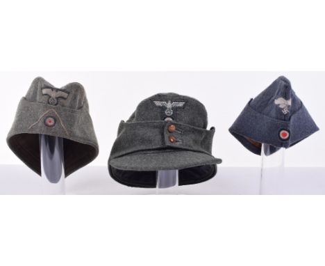 German Army M-43 Field Cap, with one piece T shaped insignia to the front. Polished two button front. Blue cloth lining to th