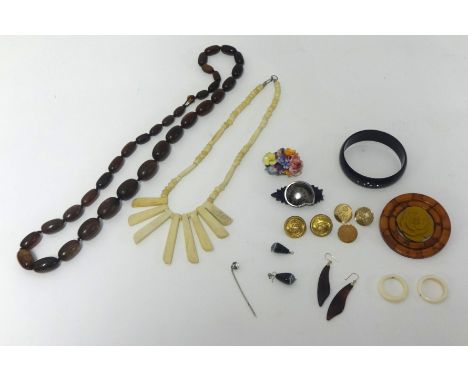 Carved bone necklace, various brooches, tie pin, gilt buttons and other items.