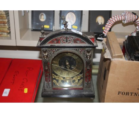 A 19th Century Boulle mantel clock with tortoise shell inlay for restoration