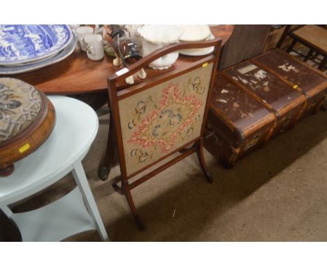 A mahogany and needlework firescreen 