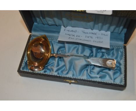 A Finnish silver ladle with a gilded bowl, circa 1931