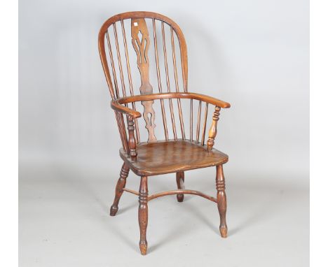 A late Victorian ash and elm stick and splat back Windsor armchair with a crinoline stretcher, height 105cm, width 53cm, dept