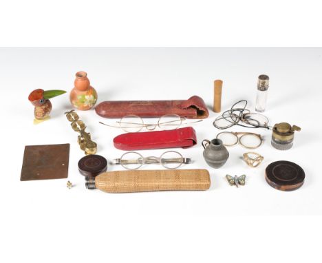 A small group of collectors' items, including a pair of George III silver spectacles, London 1807, within a red leather case,