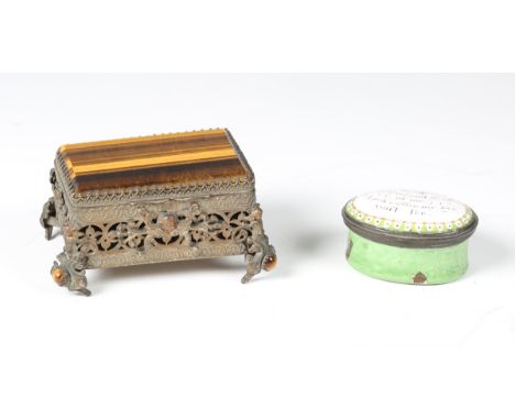 An 18th century South Staffordshire enamel oval pillbox, the hinged lid with inscribed motto, width 4.7cm, together with a la