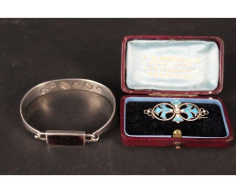 A modern silver bracelet set with Blue John and a vintage silver and enamelled brooch