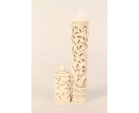 A vintage Cantonese carved ivory cylindrical container and contents