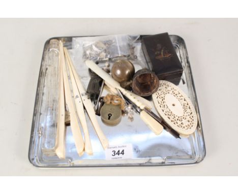 A Victorian glass scent flask, ivory glove stretchers, watch keys and sundries