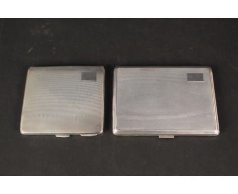 Two silver cigarette cases with engine turned decoration, vacant cartouches