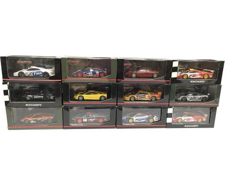12 x Minichamps 1/43 scale McLaren models: #530 184340; #530 184341; #530 194301; #530 174302; #530 164353; #530 184340; #530