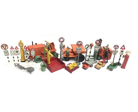 Selection of lead road signs and petrol pumps by Britains, Johillco and others, together with Triang Minic plastic dumper tru