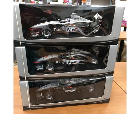 Three Paul's Model Art Minichamps 1/18 scale McLaren Mercedes F1 racing cars, Club Edition: Kimi, RN '6' (box requires a clea