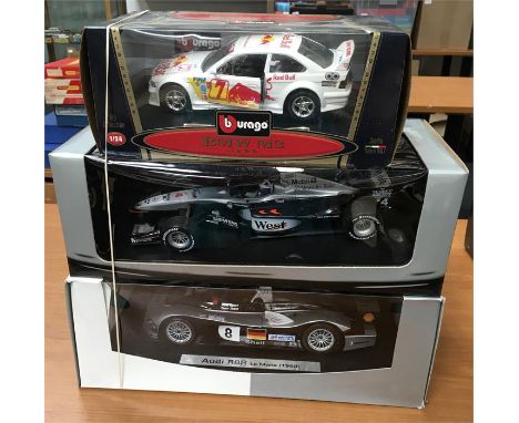 Two 1/18 scale racing cars: Minichamps Club Edition West McLaren Mercedes RN '4'; Audi R8R Le Mans 1999. Together with 1/24 s