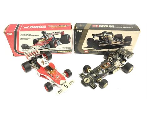 Two Corgi 1/18 scale Formula 1 cars: 190 John Player Special Lotus; 191 Texaco Marlboro McLaren. G-VG, require a clean, in G 