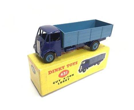 Dinky Toys 432 Guy 4-Ton Lorry with violet blue cab/chassis and mid-blue back/ hubs. G/VG in VG box.