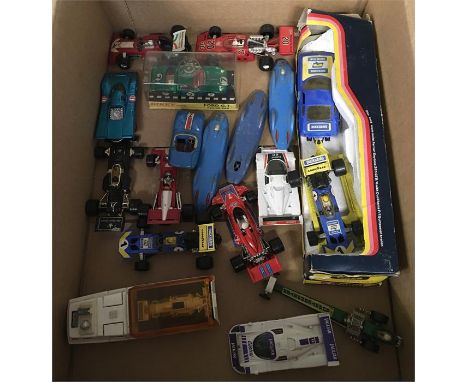 Quantity of Corgi and Dinky racing car models, includes three Corgi Proteus Campbell Bluebird, overall playworn and unboxed. 