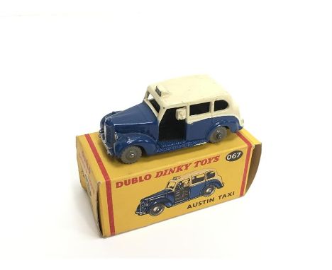 Dinky Dublo 67 Austin Taxi in blue with cream roof and grey knobbly wheels. G/VG in G/VG box (price in pen to one end flap). 