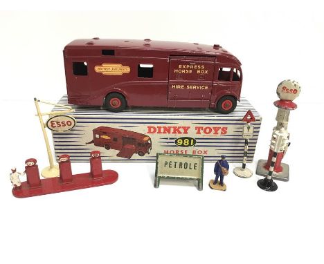 Dinky Toys 981 Horse Box 'British Railways'. G+ in G/VG box. Together with a selection of petrol pumps/ road signs, F-G unbox