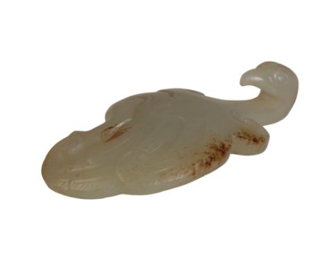 WHITE AND RUSSET JADE BUTTON HOOK, QING DYNASTY, 18TH CENTURY, modelled as a phoenix, 7cm long