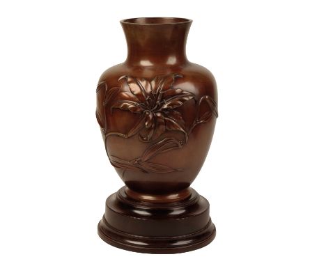 FINE JAPANESE BRONZE BALUSTER VASE, BY YOSHIMASA, MEIJI PERIOD, the sides decorated in high relief with an iris stem, 31cm hi