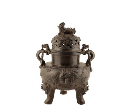 BRONZE 'PHOENIX AND DRAGON' CENSER AND COVER, QING DYNASTY, 19TH CENTURY, the pierced cloud cover surmounted by a mythical be