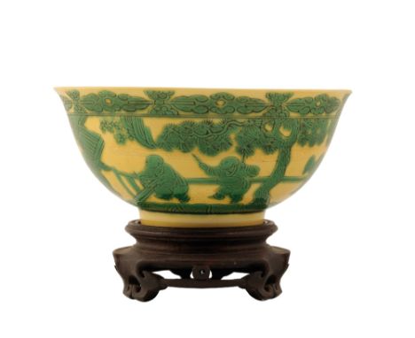 YELLOW-GLAZED GREEN-ENAMELLED 'EIGHT BOYS' BOWL, YONGZHENG SIX CHARACTER MARK AND OF THE PERIOD, of gently-rounded form with 