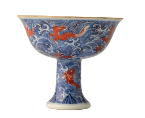 RARE UNDERGLAZE-BLUE AND IRON-RED DECORATED STEM CUP, XUANDE SIX CHARACTER MARK BUT YONGZHENG PERIOD, the rounded upper bowl 