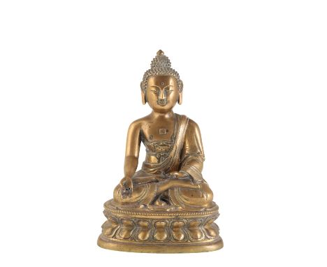 GOOD GILT-BRONZE SEATED BUDDHA, QING DYNASTY, 18TH CENTURY, depicted seated in vajraparyankasana on a double lotus pedestal a
