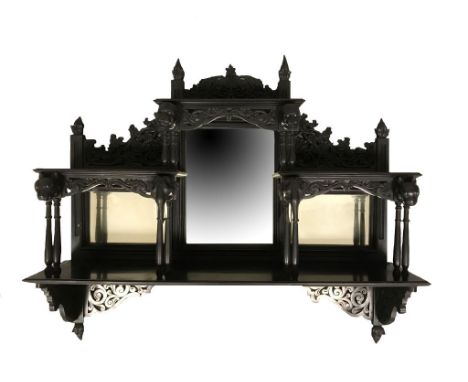 EXCEPTIONALLY FINE ANGLO-CEYLONESE CARVED EBONY MIRRORED WALL SHELF, 19th century, 62.5cm wide x 60cm high