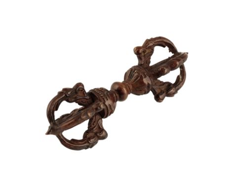 SMALL BRONZE VAJRA, TIBET, 17th CENTURY OR LATER, of double-ended form, the central knop flanked by quatrefoil pointed ends, 
