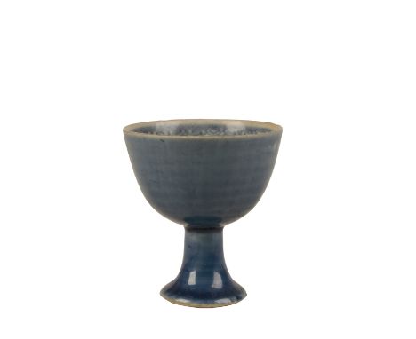 POWDER-BLUE GLAZED STEM CUP, QING DYNASTY, MID 18TH CENTURY, the rounded bowl on a straight stem and domed foot, 6.5cm high P