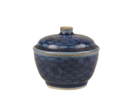 BLUE-GLAZED COVERED BOWL, TRANSITIONAL PERIOD, decorated with a fish-scale and prunus pattern, 8cm diam Provenance: The Hatch