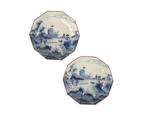 PAIR OF KAKIEMON BLUE AND WHITE VAN FRYTOM STYLE DECAGONAL DISHES, EDO PERIOD, 18TH CENTURY each painted with a view of Schev