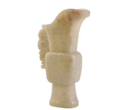 FINE WHITE JADE EWER, QIANLONG PERIOD, the sides finely carved with taotie masks and stylised motifs, within bands of key fre
