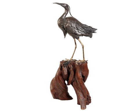 FINE JAPANESE SILVERED AND GILT BRONZE CRANE, BY MASATSUNE, MEIJI PERIOD, the finely cast bird standing on a naturalistic woo