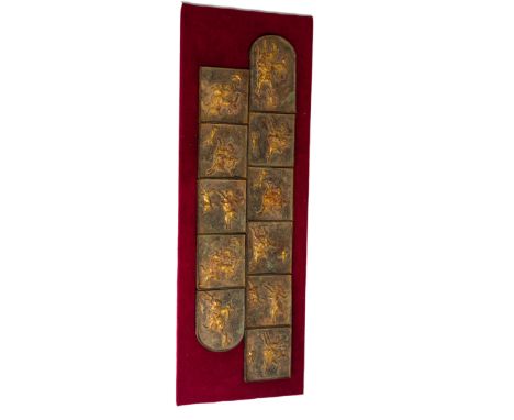 'ARCHAIC' BRONZE EQUSTRIAN HUNTING SCENE BELT, with a later fitted stand, 72cm long approx.