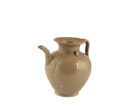 YUEYAO GREEN-GLAZED MELON-SHAPED EWER, FIVE DYNASTIES PERIOD, 10TH CENTURY, of segmented form with a flared neck, strap handl