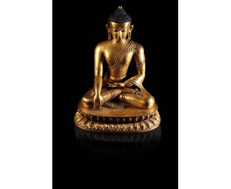 FINE GILT-BRONZE FIGURE OF BUDDHA SHAKYAMUNI, TIBET, 15TH CENTURY, seated in vajrasana on a double-lotus pedestal, his right 
