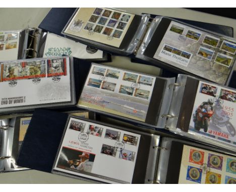 NINE SIMILAR BLUE ALBUMS OF ISLE OF MAN FIRST DAY COVERS each folder titled 'Isle of Man Post Office Cover Album' (9)