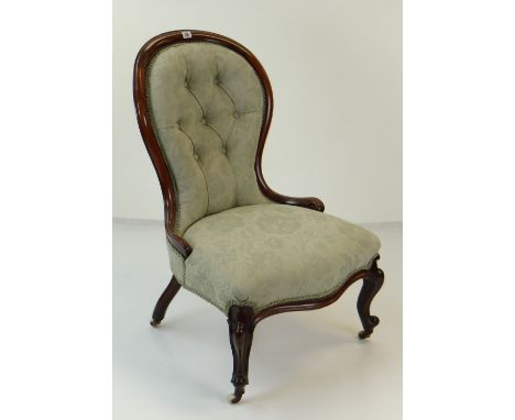 LATE VICTORIAN MAHOGANY SPOON-BACK LADIES CHAIR in floral pastel blue upholstery, white ceramic casters Condition Report: rea