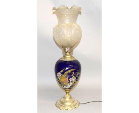 A blue based oil lamp converted to electric