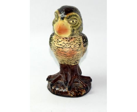 A ceramic grotesque bird tobacco jar in the Martin Brothers style
