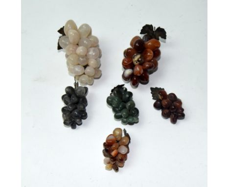 A collection of jade and other semi precious stones in the form of bunches of grapes
