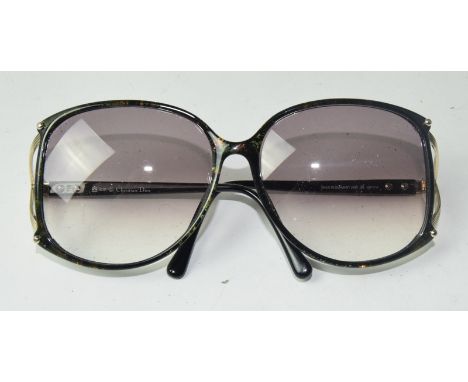 Vintage Christian Dior sunglasses and a magnified set of engineers glasses