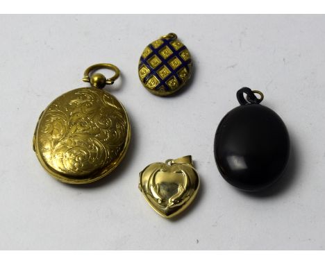 A 9ct yellow gold heart shaped locket, another inset with enamel, a bog oak locket and another