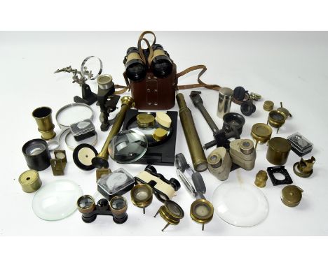 Large collection of lenses. Jewellery loops, binoculars, projector lens and clear magnifiers