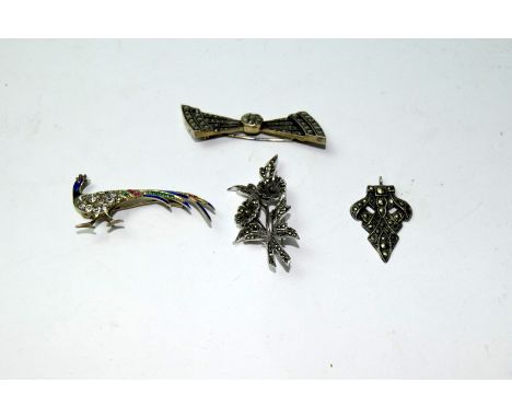 A selection of four marcasite set brooches, one stamped 935 inset with enamel