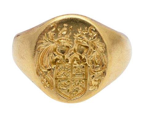 An 18ct gold crested signet ringthe engraved crest with quartered shield total weight 9.7., ring size LCondition:In good over