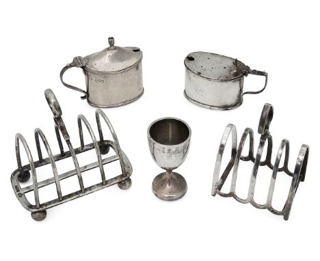 A collection of silver to include two four division toast racks and two mustard potsfirst Sheffield, 1922, Goldsmiths &amp; S